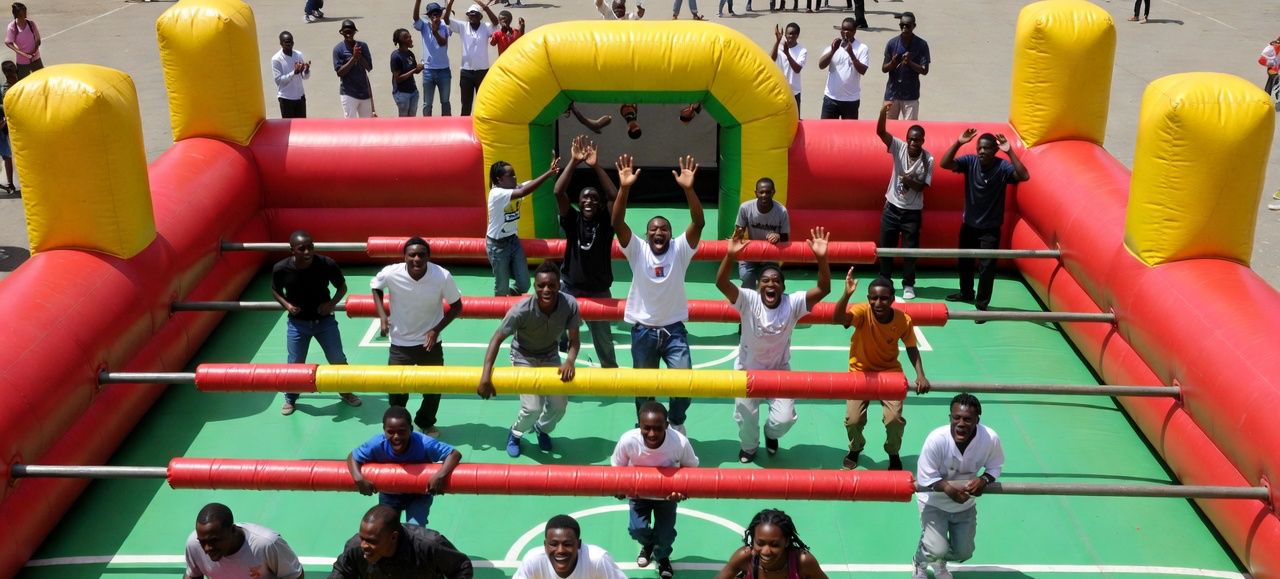 Human foosball activation — players on a life-size court